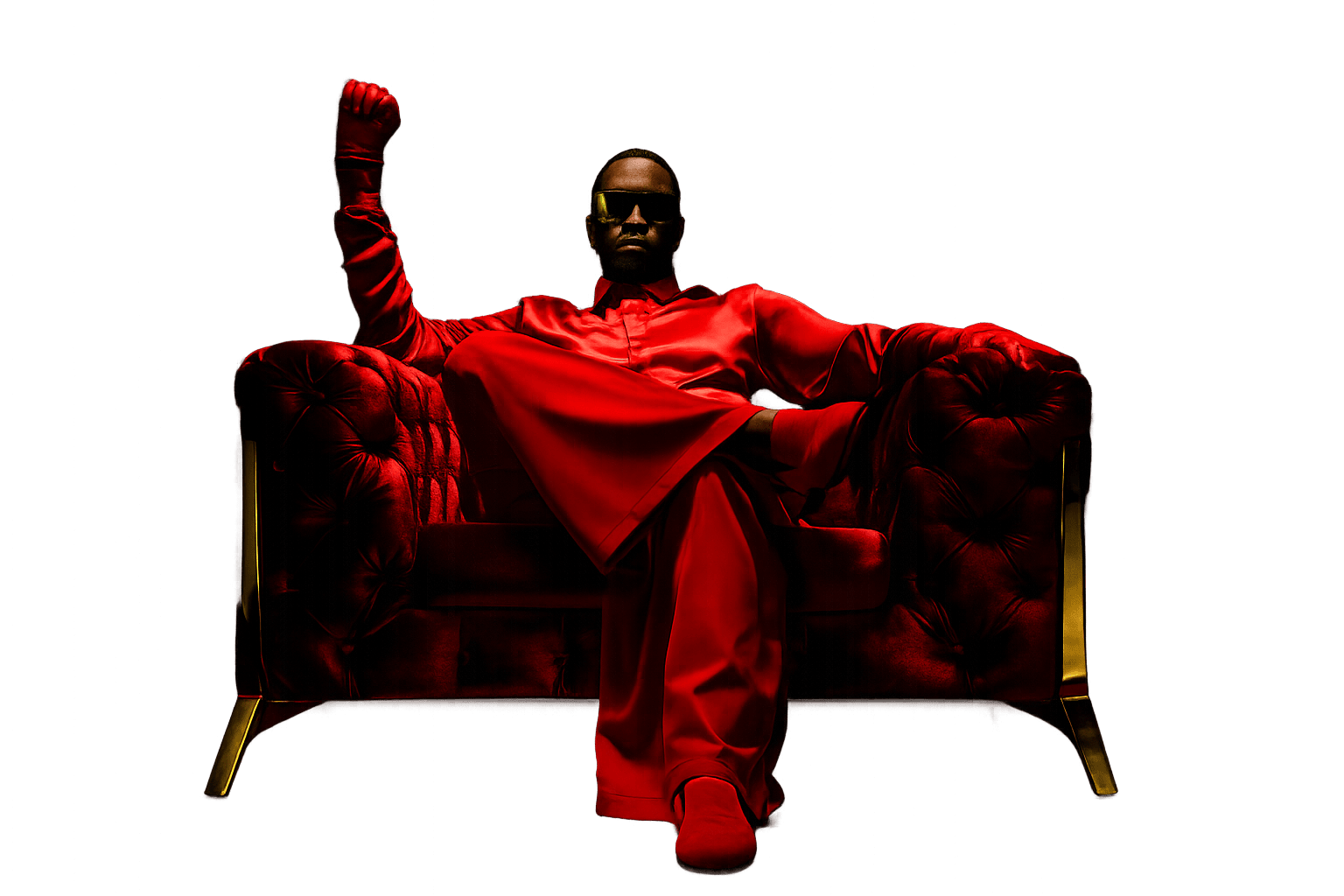 Diddy seated in a red outfit on a red armchair against a dark backdrop.